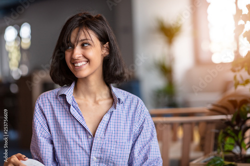 Portrait of young freelancer woman in modern work space Free Download Portrait of young freelancer woman in modern work space - GFXLoad
