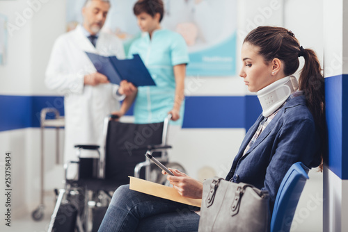 Young patient in the waiting room at the hospital photo