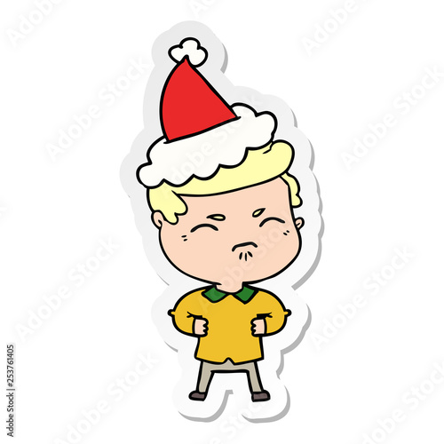 sticker cartoon of a annoyed man wearing santa hat