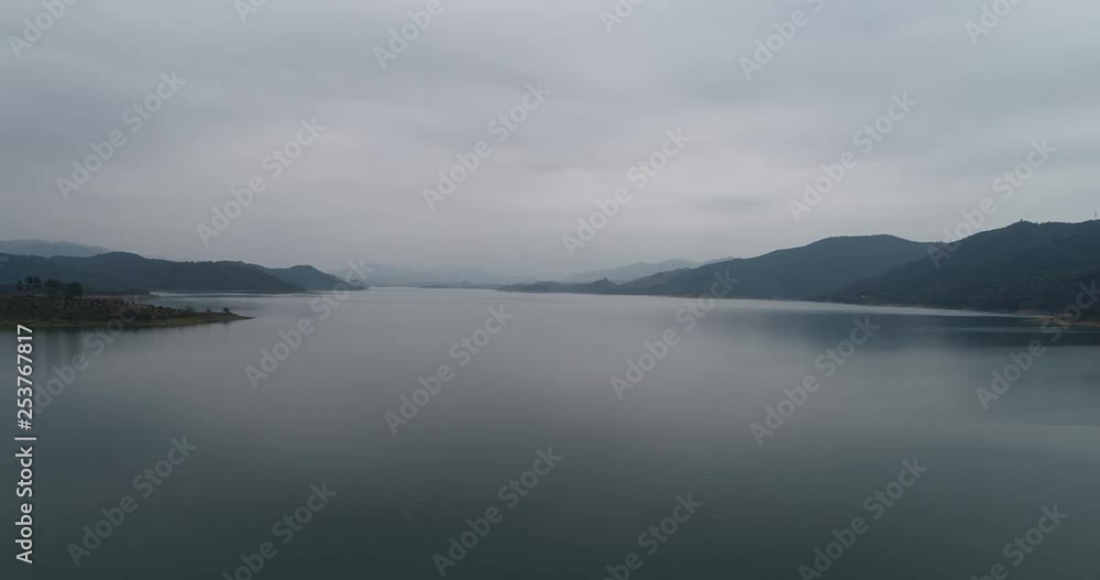 aerial view of man kayaking on lake aerial view of man kayaking on lake