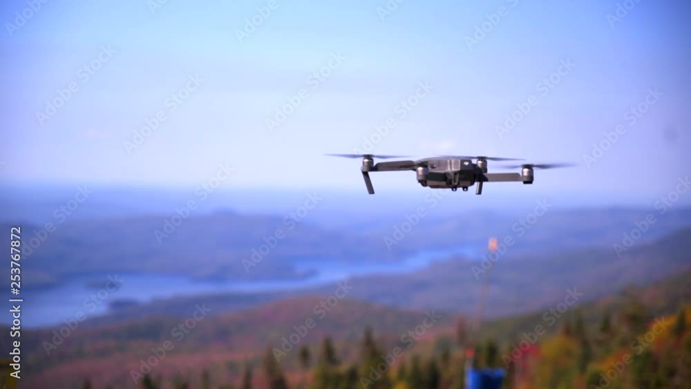 Cinematic shot of a drone while hovering during summer / autumn season. Cinematic shot of a drone while hovering during summer / autumn season.