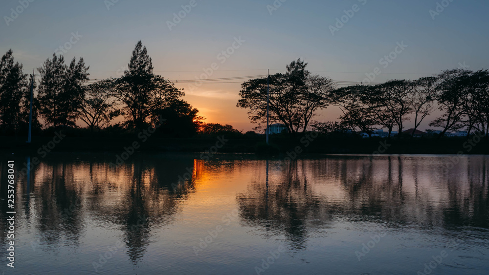 Small lake in the evening summer , Thailand