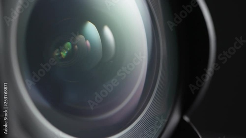 Macro close up shot of wide angle lens spinning towards camera