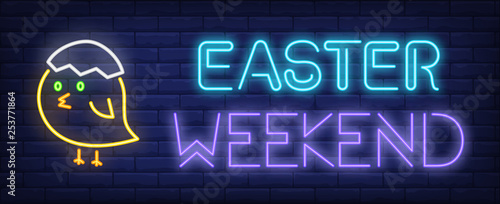 Easter weekend neon sign. Chicken with egg shell