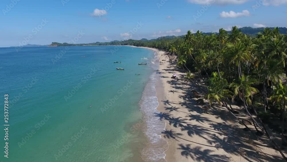 Aerial viewo of Nga Pali Beach with green tropic palms and blue sea in Myanmar Aerial viewo of Nga Pali Beach with green tropic palms and blue sea in Myanmar