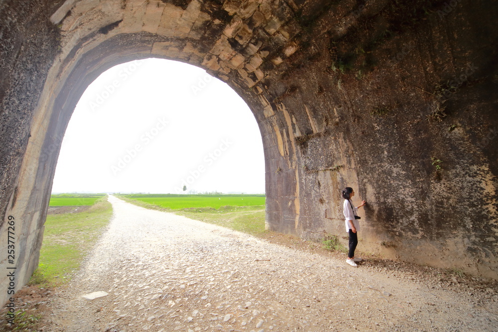 woman traveling to Ho citadel in Thanh Hoa, Vietnam