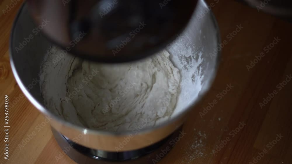Stand mixer preparing dough for pizza, croissants or bread Stand mixer preparing dough for pizza, croissants or bread