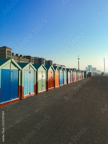 Row of beautiful beach huts on Brighton and hove beach seafront, Sussex, England