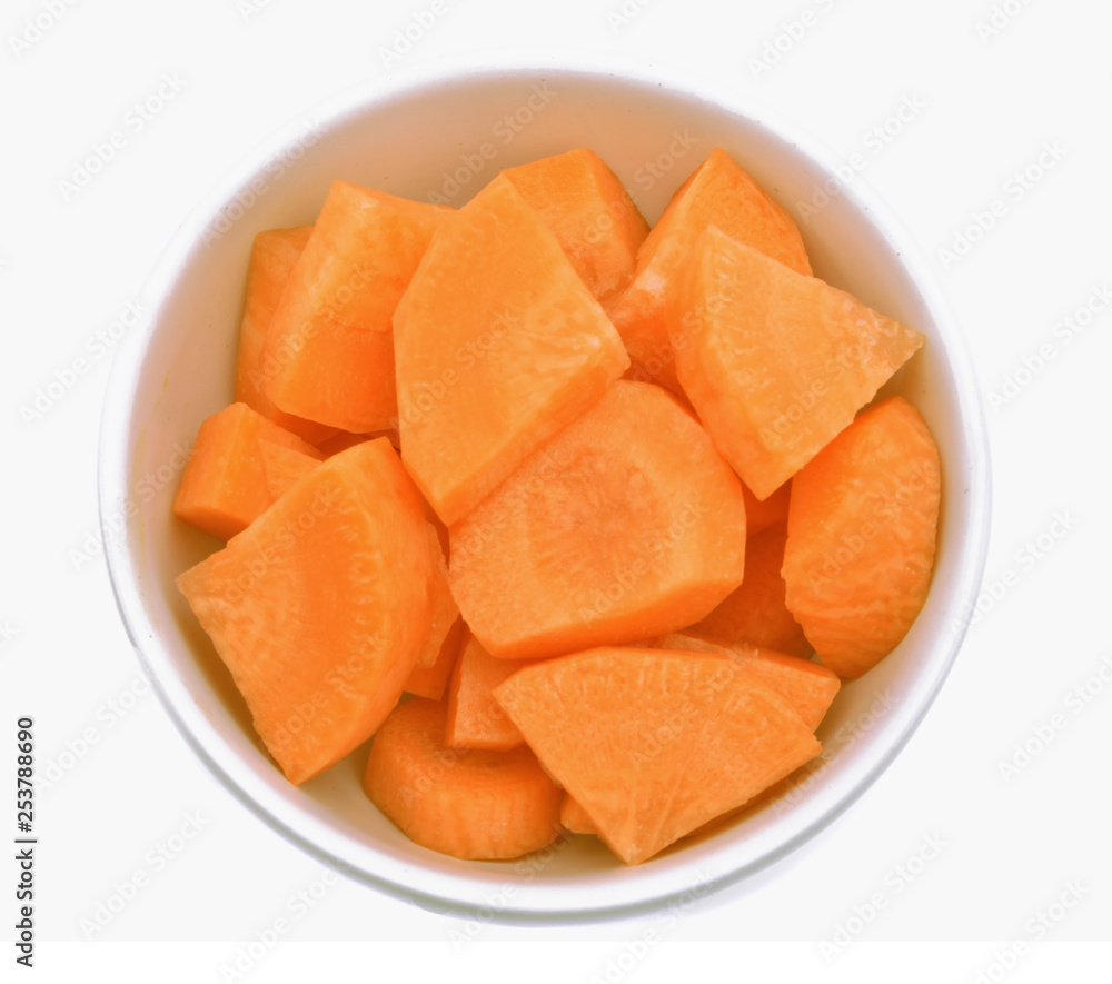 Sliced carrots isolated on white background. Top view. Sliced carrots isolated on white background. Top view.