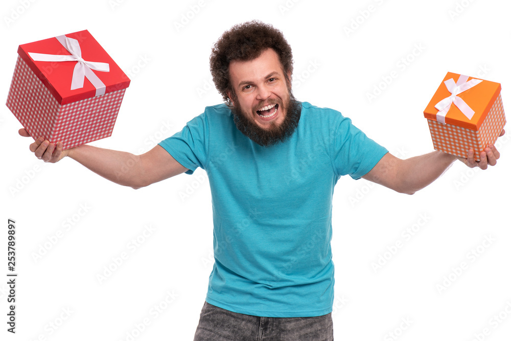 Crazy bearded Man with funny Curly Hair, isolated on white background. Happy guy holding gift boxes. Holidays concept. Crazy bearded Man with funny Curly Hair, isolated on white background. Happy guy holding gift boxes. Holidays concept.