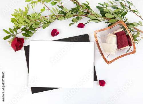 Burgundy wedding invitation mockup with pettals photo