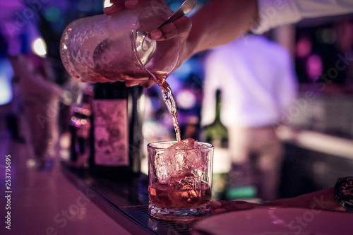 Photography Whiskey on the rock at rooftop bar