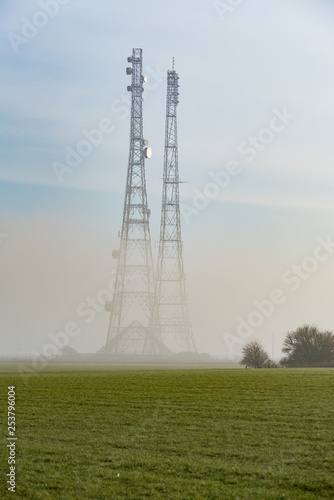 Mist Covered Communication Masts