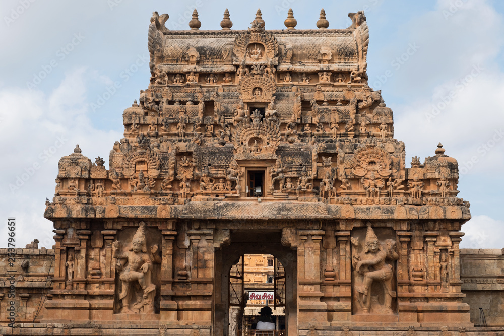 An entrance, or Gopuram’,  to the Brihadeshwara temple at Tanjore in Tamil Nadu with guards, or Dvarapalas, depicted on each side