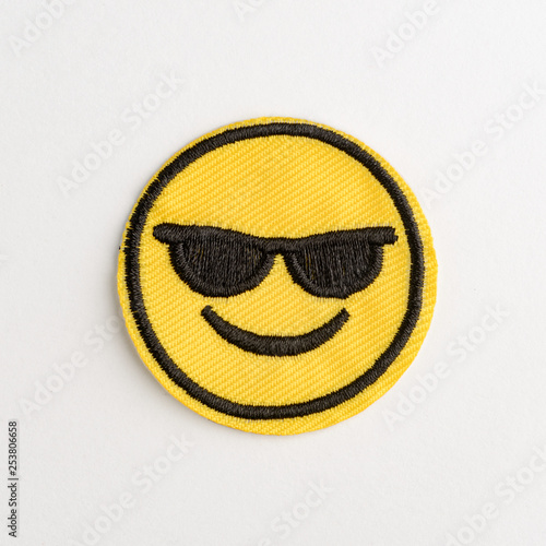 Emoji smile embroidered patch