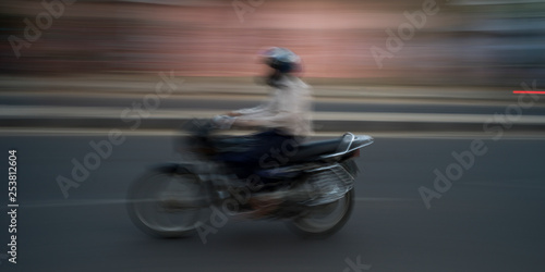 Blurred motion view of a person riding a motorcycle, Amer Road, Jaipur, Rajasthan, India