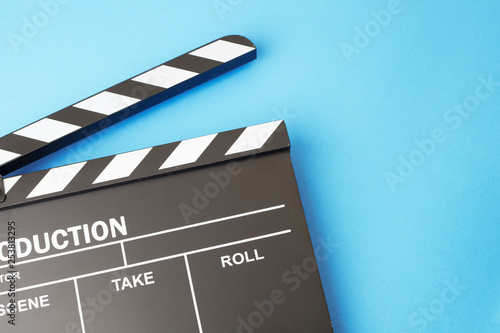 Фототапет Movie clapper-board on blue background
