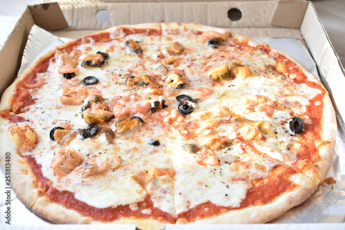 Sea pizza in a box.