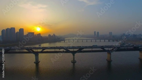 Seoul, subway scenery passing Han-river Cheongdam Bridge, sunset photo