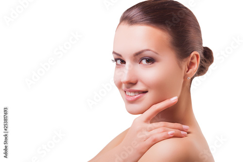 Closeup portrait of very beautiful woman. Female face on isolated white background. Gorgeous brunette woman with perfect smooth skin. Facial portrait of young model.