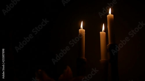 3 candles in the dark photo