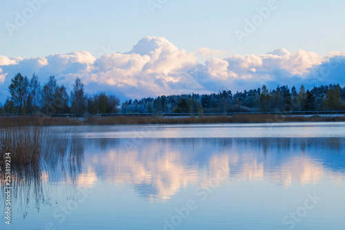 Fototapeta Naklejka Na Ścianę i Meble -  Landscape with a river and a skylight at dawn