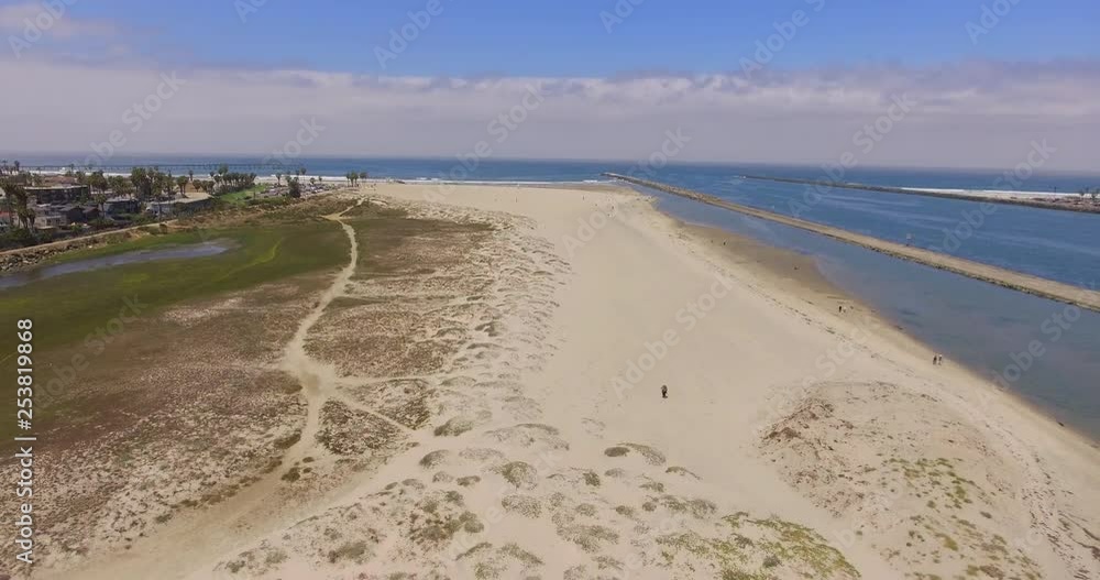 An aerial view of a beautiful sunny day at the beach. An aerial view of a beautiful sunny day at the beach.