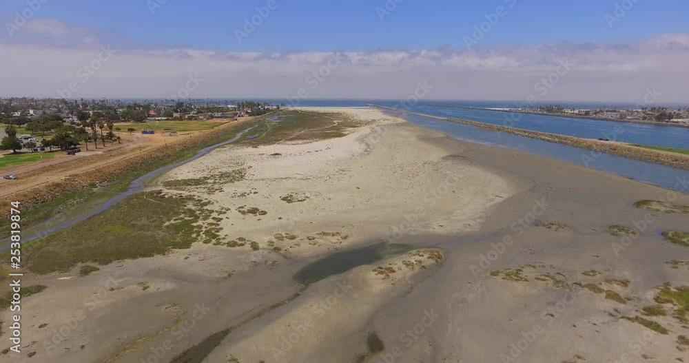 An aerial view of a beautiful sunny day at the beach. An aerial view of a beautiful sunny day at the beach.