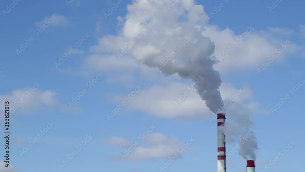 Smoke comes from the chimney. Air pollution concept Smoke comes from the chimney. Air pollution concept