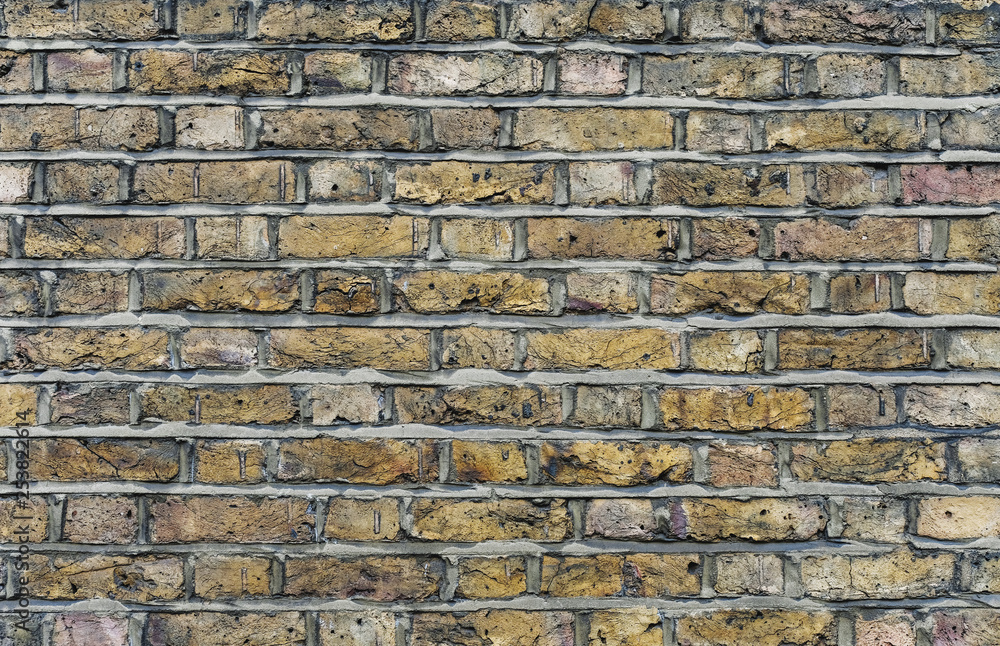 old yellow brick wall