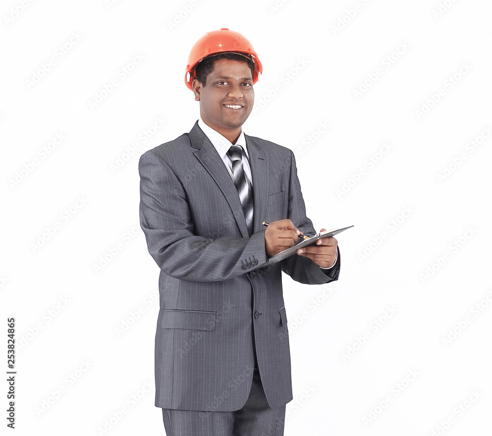 handsome engineer architect signing a contract.isolated on white handsome engineer architect signing a contract.isolated on white