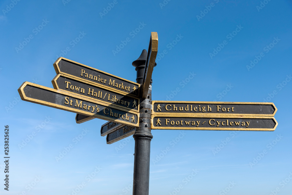 Fototapeta premium Bideford, North Devon, England UK. March 2019. Bideford town signpost to places in the town centre.