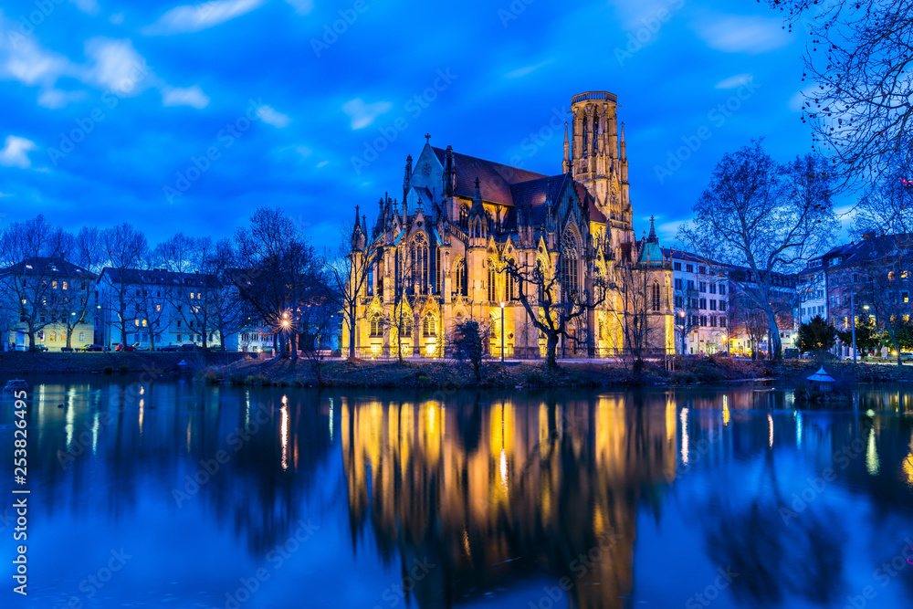 Germany, Stuttgart feuersee cathedral reflecting in water