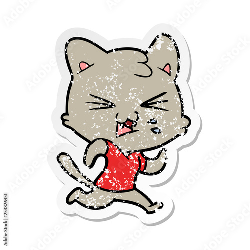 distressed sticker of a cartoon hissing cat