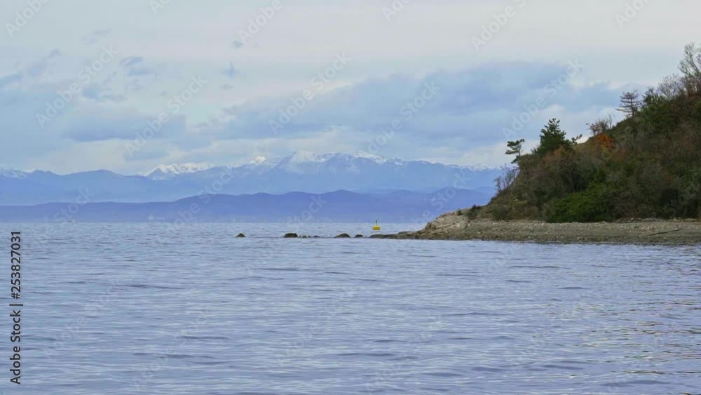 The sea lagoon at Strunjan Nature Reserve on a beautiful cloudy day. Slovenia. Flat plane. Slow motion The sea lagoon at Strunjan Nature Reserve on a beautiful cloudy day. Slovenia. Flat plane. Slow motion