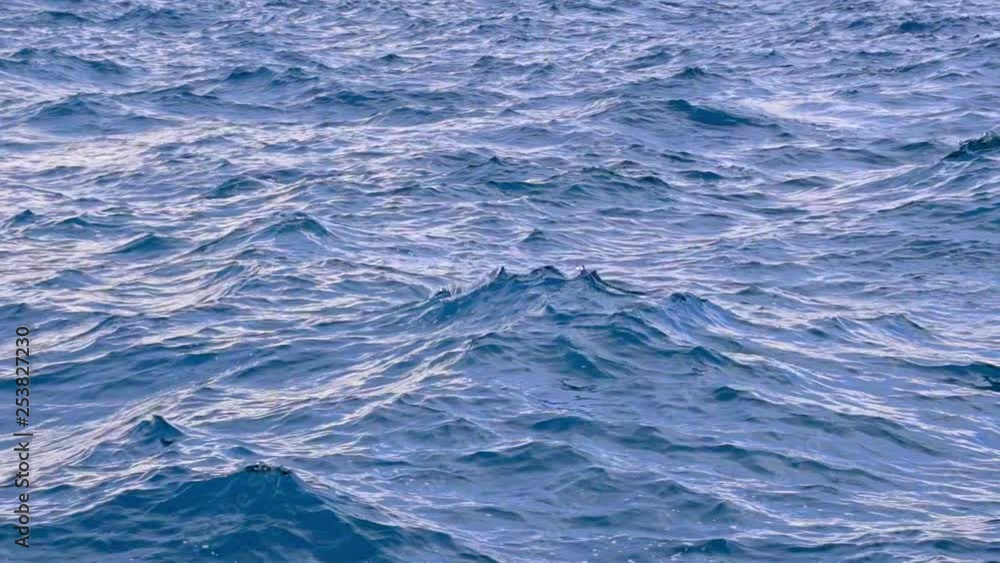 Beautiful detail of the go and come mesmerizing of the sea waves. Adriatic Sea. Croatia. Flat plane. Slow motion Beautiful detail of the go and come mesmerizing of the sea waves. Adriatic Sea. Croatia. Flat plane. Slow motion