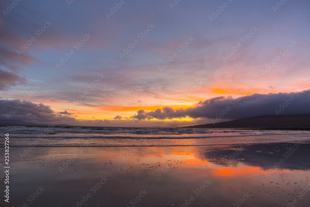 Colorful Sunset and moon in the sky  over  Beach in County Mayo Mulranny Ireland