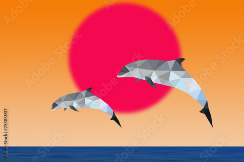 Fototapeta Naklejka Na Ścianę i Meble -  2 dauphins sautant au coucher de soleil en origami