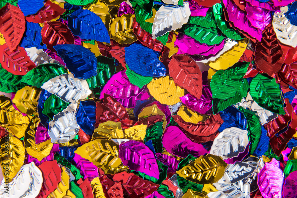 Flat lay of small multicolored rainbow leaves texture background. Flat lay of small multicolored rainbow leaves texture background.