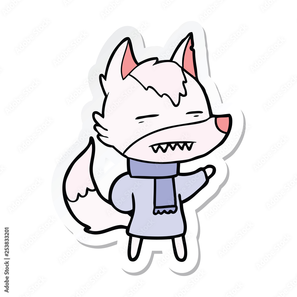 sticker of a cartoon wolf in winter clothes