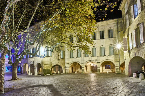 Herbs square at night, Uzes, France photo