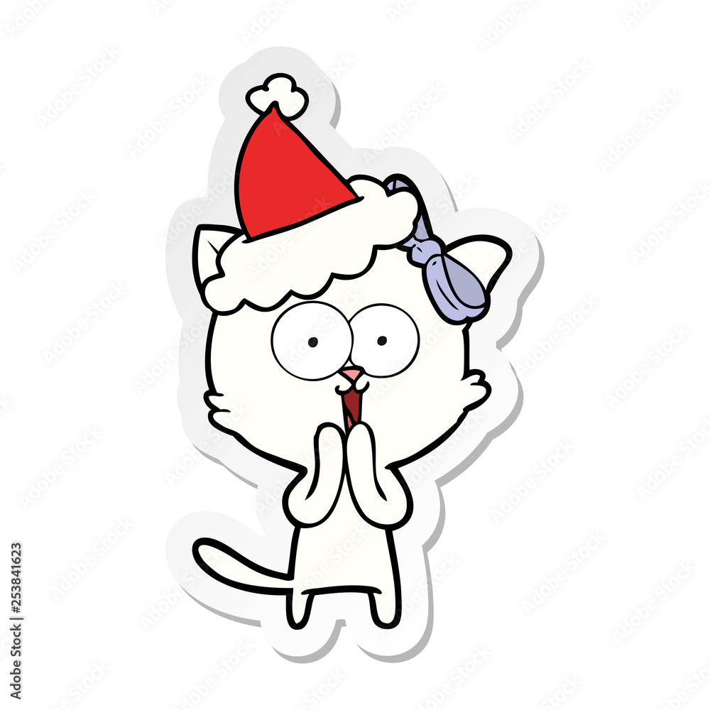 sticker cartoon of a cat wearing santa hat