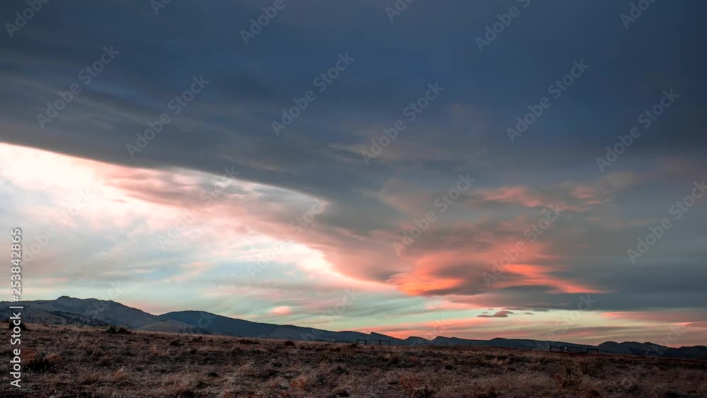 Time lapse o sunset and lenticular clouds in Boulder, Colorado Time lapse o sunset and lenticular clouds in Boulder, Colorado