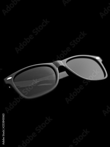 Black sunglasses on black background
