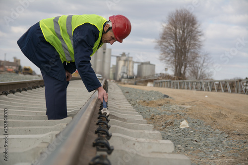 Senior worker working on the railroad
