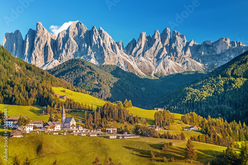 Famous alpine place Santa Maddalena village with magical Dolomites mountains in background, Val di Funes valley, Trentino Alto Adige region, Italy, Europe