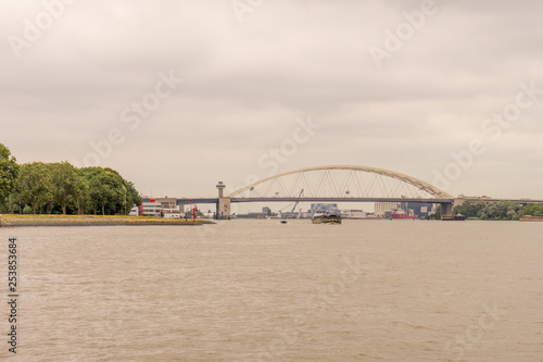 Netherlands, Rotterdam, The Van Brienenoord Bridge (Dutch: Van Brienenoordbrug) is a large twin tied-arch motorway bridge in the Netherlands photo