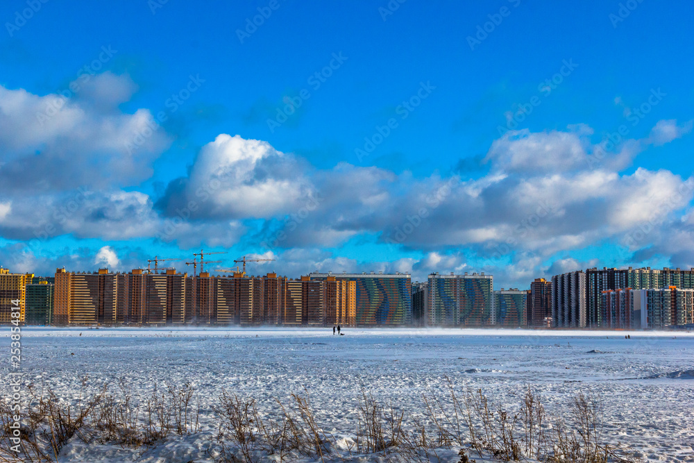 multi-storey residential buildings in the big city. Winter cityscape St. Petersburg district Murino