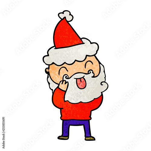 man with beard sticking out tongue wearing santa hat © lineartestpilot