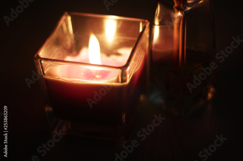 Romantic theme: candle and few aroma sticks